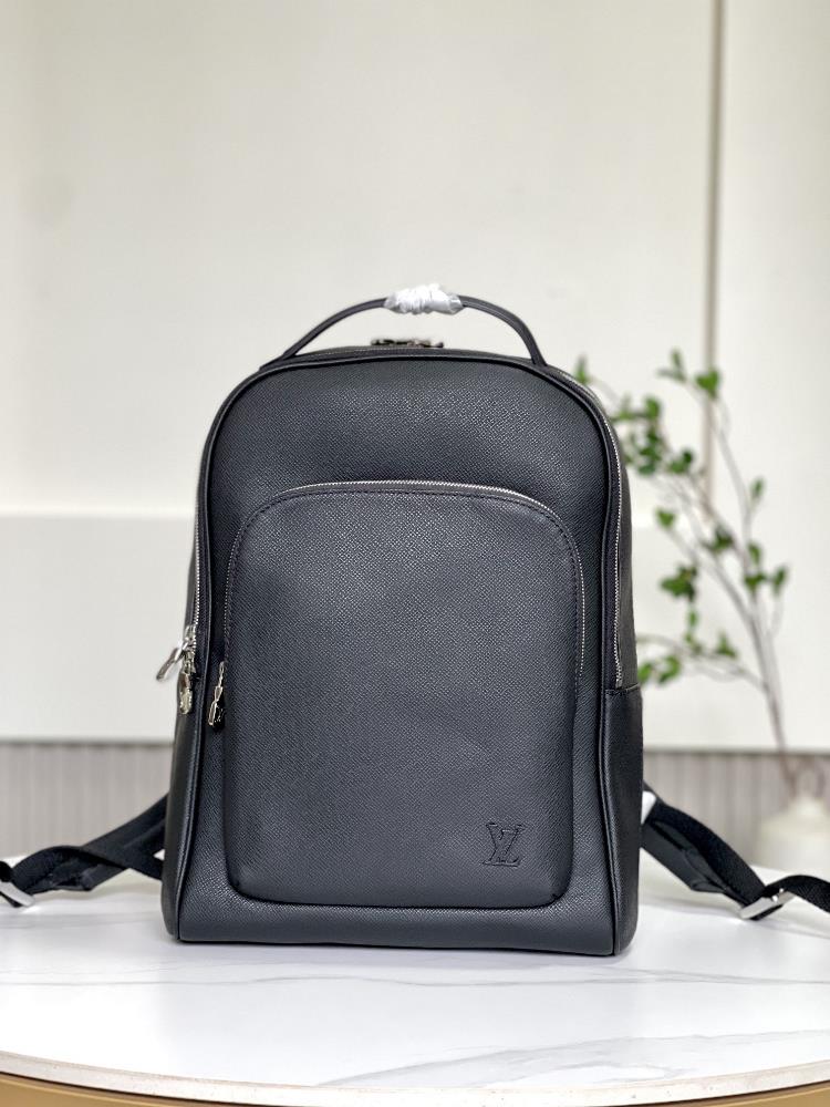 The toplevel original M30977 Cross Pattern Avenue backpack features Taiga leather with cowhide trim and metal pieces blending practical functionalit