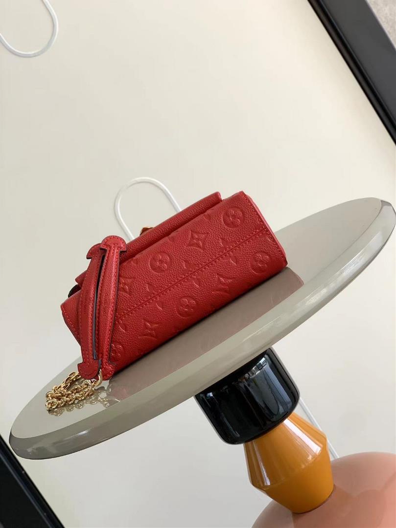 M44550The smooth and embossed Monogram Imprente combines silky and textured texture with
