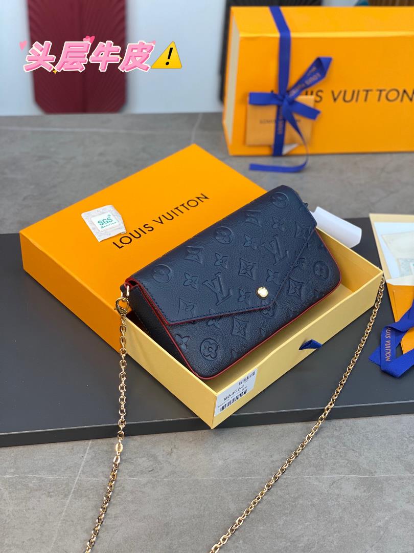 The M64064 navy blue Pochette Flice chain bag features a Monogram Imprente leather embossed Louis Vu