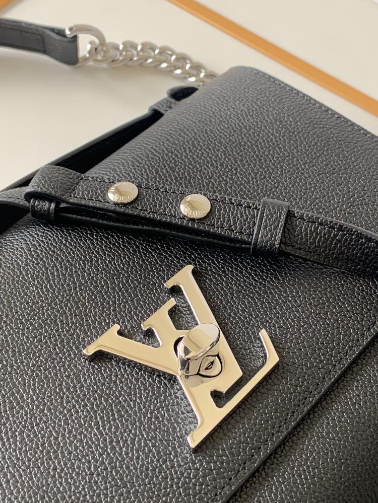 M56088 M56087Lockme CLUTCH Handbag This Lockme handbag includes the iconic Ltwist lock an