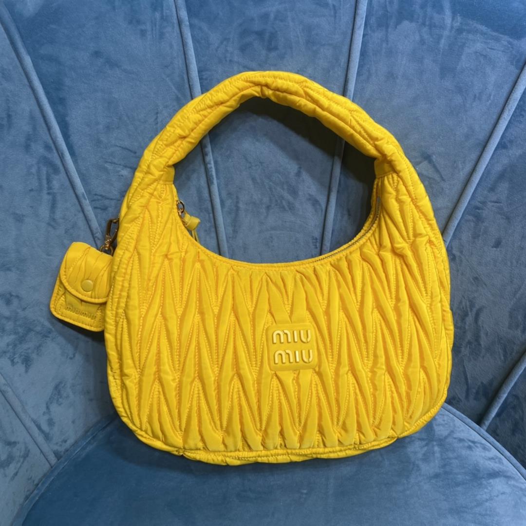 M Familys New Underarm BagThe 5BC108 MiuMiu new bag MiuWander handbag is made of environmentfriendly